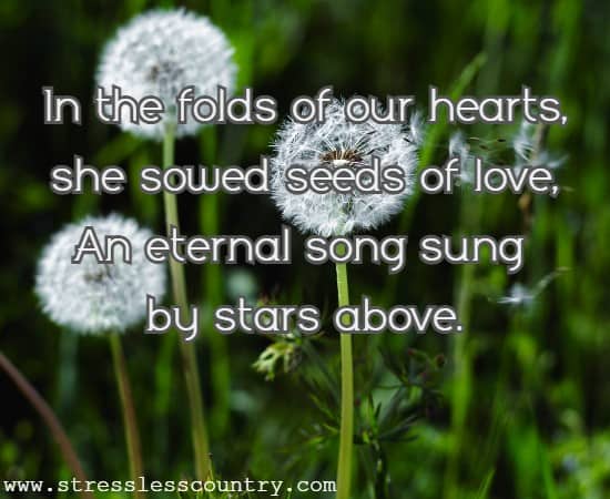 In the folds of our hearts, she sowed seeds of love, An eternal song sung by stars above.