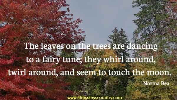 The leaves on the trees are dancing to a fairy tune; they whirl around, twirl around, and seem to touch the moon.